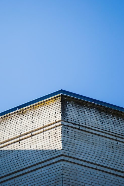 building-corner-with-sky_23-2148106888